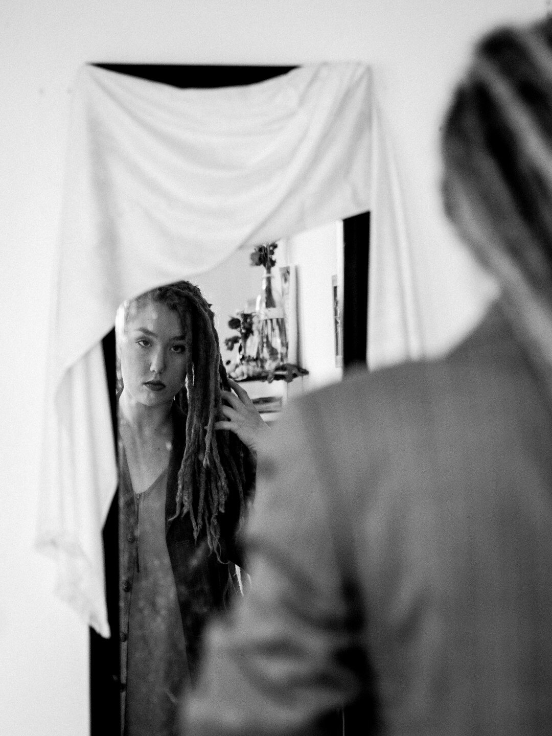 man practicing speech in mirror