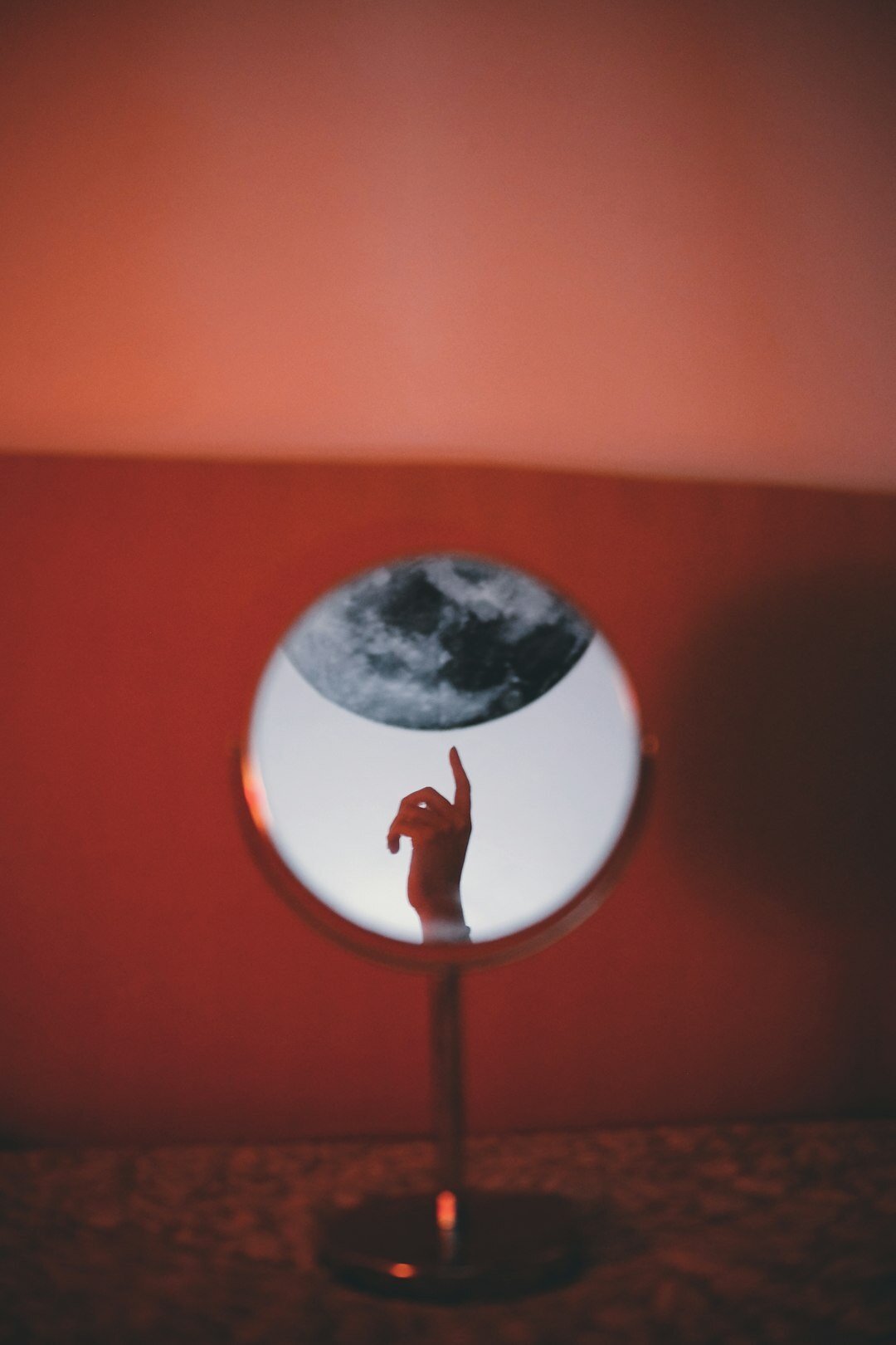 person reflecting in mirror